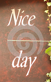 A have a `Nice Day` script on a red marbled background.