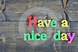 Have a nice day on wooden table