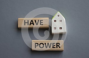 Have power symbol. Wooden blocks with words have power. Beautiful grey background. Business and have power concept. Copy space