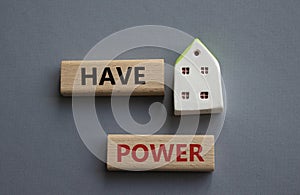 Have power symbol. Wooden blocks with words have power. Beautiful grey background. Business and have power concept. Copy space