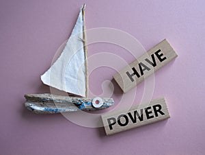 Have power symbol. Wooden blocks with words have power. Beautiful pink background. Business and have power concept. Copy space