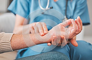 Have you been under stress. a nurse checking the pulse of her elderly patient.