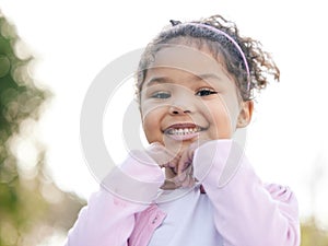 Have you smiled today. Portrait of an adorable little girl having fun outdoors.