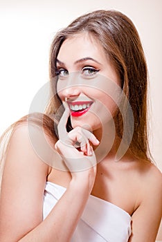 Having fun cheerful beautiful woman with red lips happy smiling looking at camera on light copy space background closeup portrait