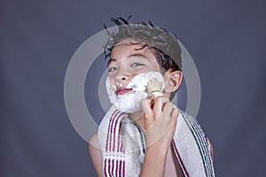 Having fun with shaving cream.