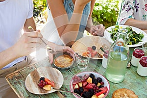 Having an outdoors picnic