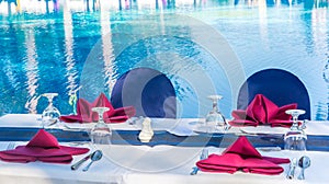 Having special menu beside ocean blue water pool