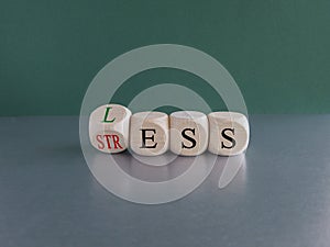 Having less stress or being stress-less. The word \'STRESS\' and \'LESS\' on wooden cubes.