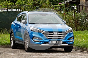 Blue Hyundai Tucson TL SUV car parked at parking lot