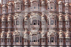 Hawa Mahal, pink palace of winds in old city Jaipur, Rajasthan, India. Background of indian architecture