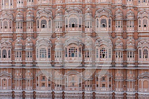 Hawa Mahal, pink palace of winds in old city Jaipur, Rajasthan, India. Background of indian architecture