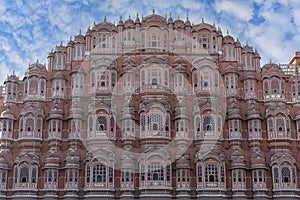 Hawa Mahal, pink palace of winds in old city Jaipur, Rajasthan, India. Background of indian architecture