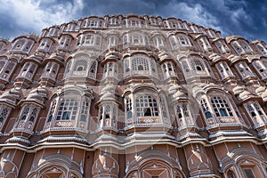 Hawa Mahal, pink palace of winds in old city Jaipur, Rajasthan, India. Background of indian architecture