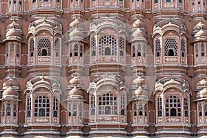 Hawa Mahal, pink palace of winds in old city Jaipur, Rajasthan, India. Background of indian architecture