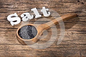 Hawaii black salt on wooden spoon