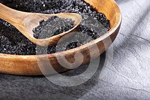 Hawaii black salt on wooden spoon