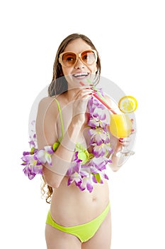 Hawaii woman in bikini wearing flower lei garland of pink orchid