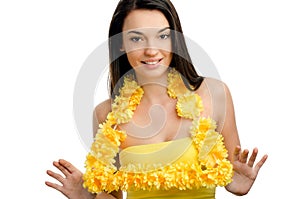 Hawaii woman showing a yellow flower lei garland.