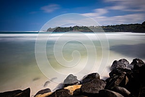 Hawaiian bay with rocks on a beach