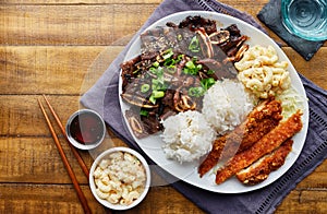 Hawaiian bbq plate with mix of chicken katsu, korean kalbi beef short ribs, rice, and macaroni salad