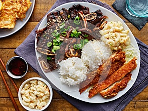 Hawaiian bbq plate with mix of chicken katsu, korean kalbi beef short ribs, rice, and macaroni salad