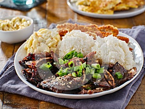 Hawaiian bbq plate with mix of chicken katsu, korean kalbi beef short ribs, rice, and macaroni salad