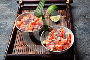 Hawaiian food Salmon Lomi Lomi. Salmon with tomatoes, onion and lemon