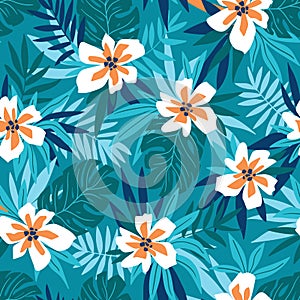 Hawaiian seamless pattern with pink flowers and blue tropical leaves. Stylish floral endless print for summer fabric design.