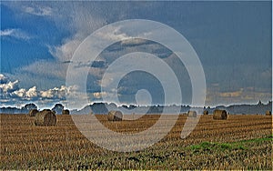 Hay bale water colours within a torrential downpour.