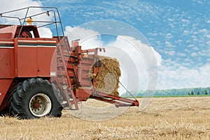 Hay baler in the field