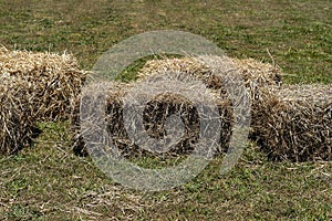 Hay Bales As Seats At A Country Fair