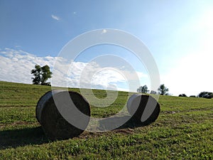 Hay bales on the meadow during autumn.