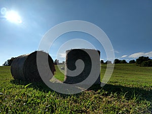 Hay bales on the meadow during autumn.