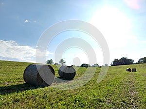 Hay bales on the meadow during autumn.