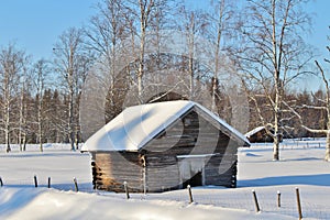 Hay barn in winter landscape