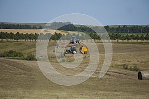 Hay field in North Dakota with hay bales