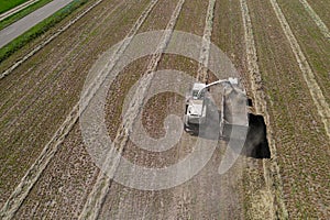 Hay harvesting from the field top view from the drone