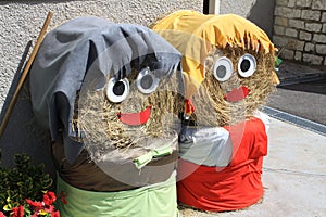 Hay puppets in Folgaria downtown, Italy