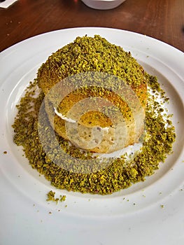 Hayrabolu dessert.Cheese and Pistachio Powder with buttercream. Kemalpasa