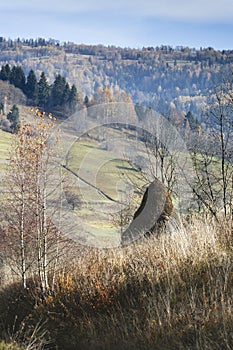 haystack in the background of mountains