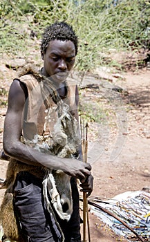 Hazabe bushman of the hadza tribe with arrows in the hands for hunting