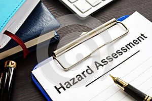 Hazard assessment form with clipboard on a desk