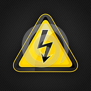 Hazard warning triangle high voltage sign on a metal surface