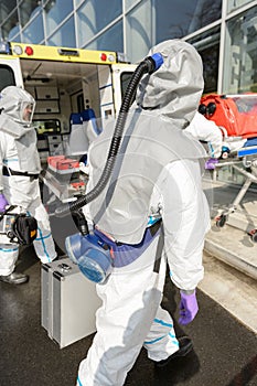 Hazardous pandemic medical team with equipment