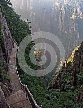 Hazardous pathway over the precipice in Huang Shan, china photo