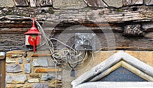 Hazardous, risky electric cabling, wiring outside of an an old house in Rouen, France