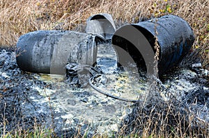 Hazardous waste. Spillage of toxic waste in nature photo