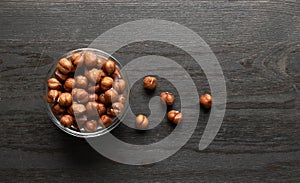 Hazelnut on a wooden background