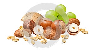 Hazelnuts and almonds in shell, green grapes and rolled oats isolated on white background. Nuts, fruit and cereal mix