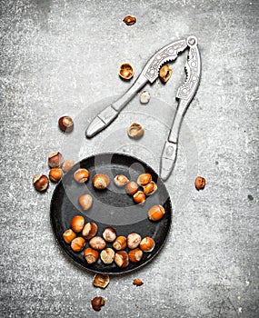 Hazelnuts and a Nutcracker in the old pan.